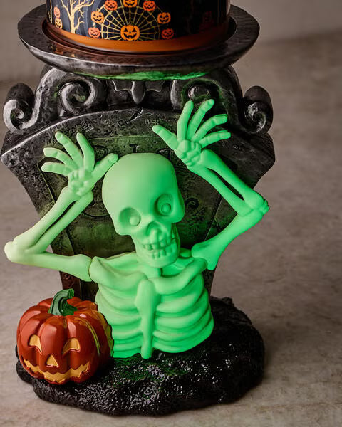 Porta vela calavera brilla en la oscuridad
