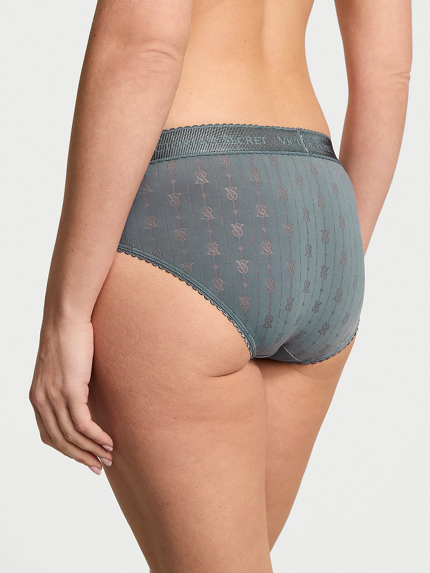 Panti estilo hiphugger con logo de punto pointelle