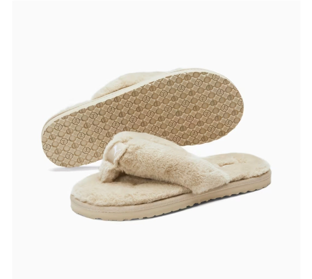 Pantuflas amarillas puma